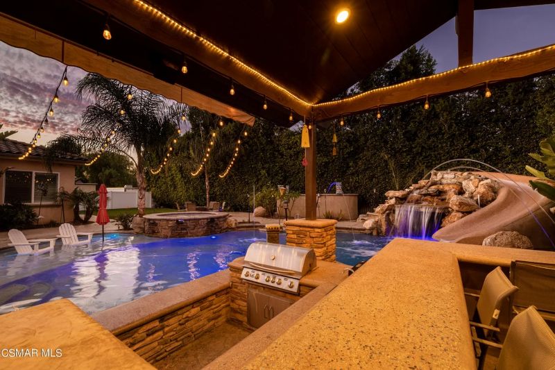 Outdoor kitchen and pool area