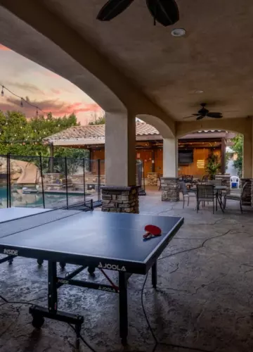 Poolside ping pong table | New Breath Recovery