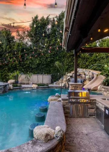 Backyard with pool and grill | New Breath Recovery